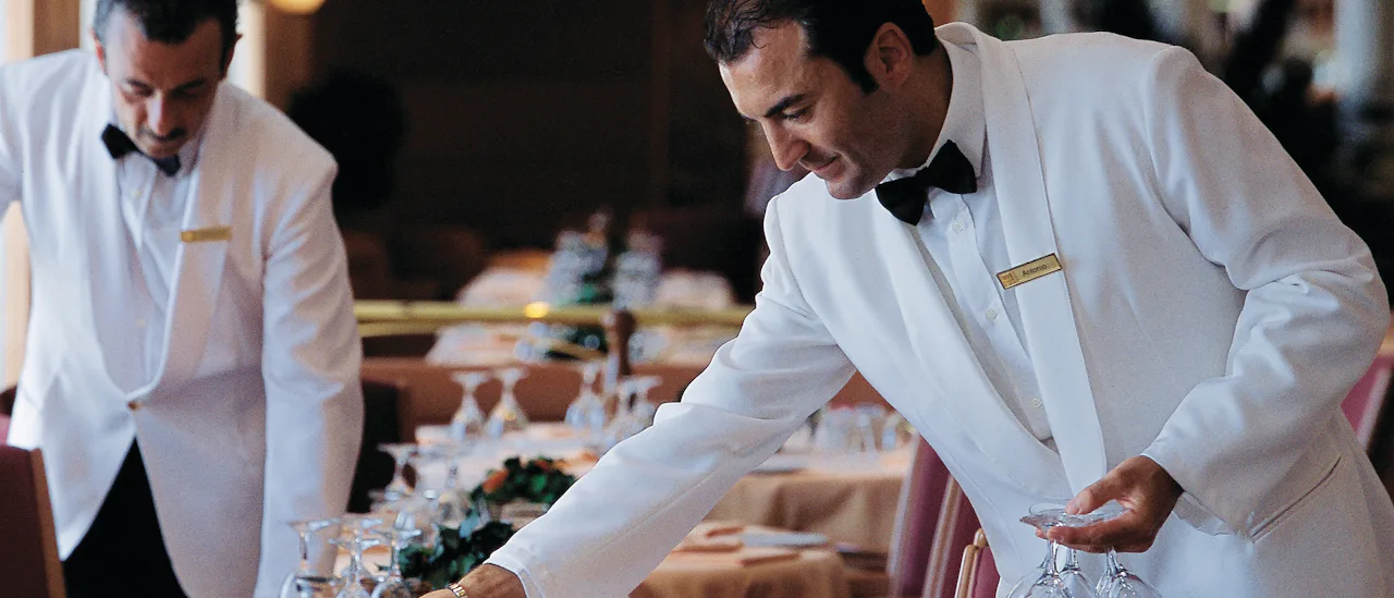 Waiters tending to table on a MSC Cruises ship