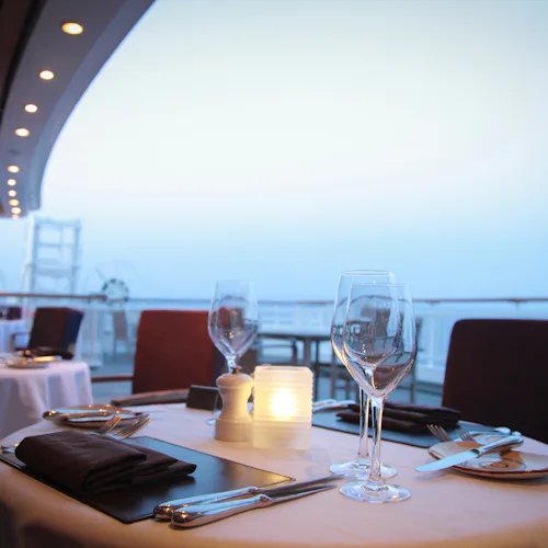 Tables and chairs in a restaurant on a P&O Cruises ship